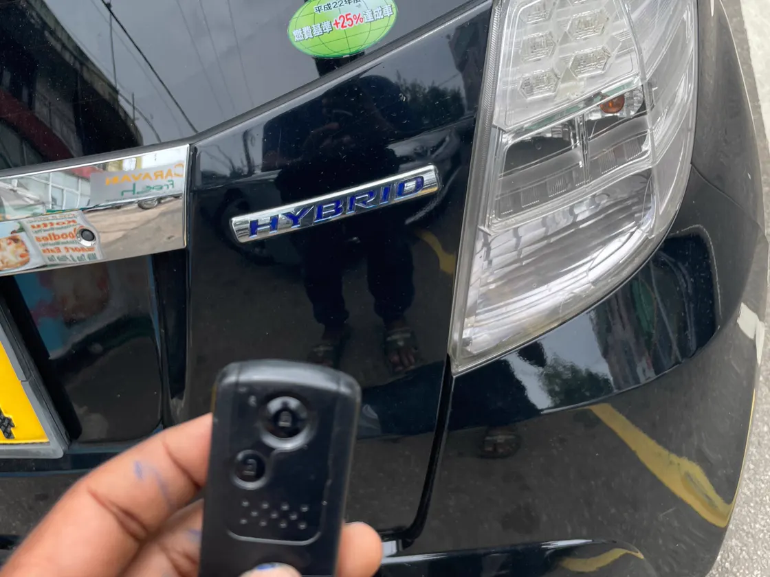 Remote key beside a hybrid vehicle